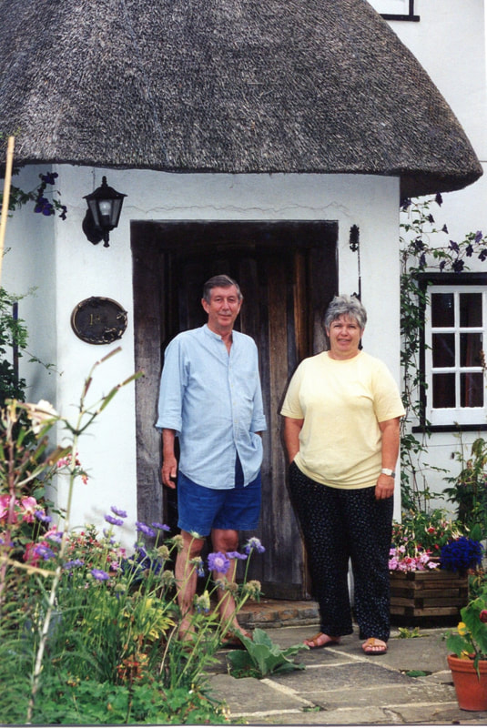 two people in front of door