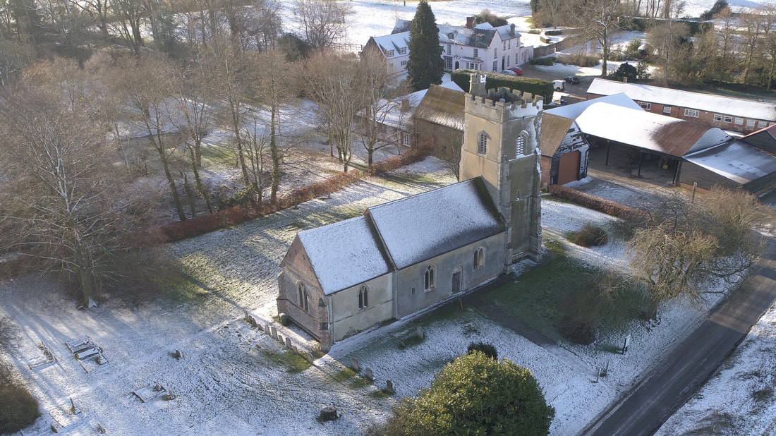 aerial view of churchyard from NE