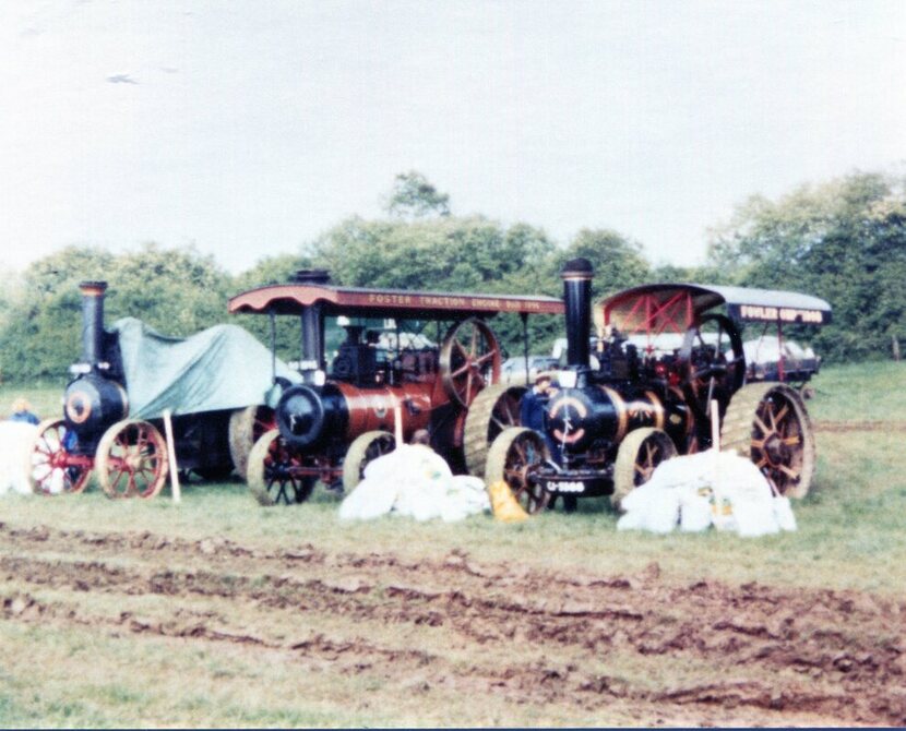 staem engines in a field