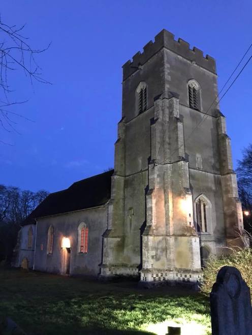 church tower light at night
