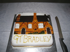 Cake to celebrate re-opening of Village Hall after it flooded, 2011
